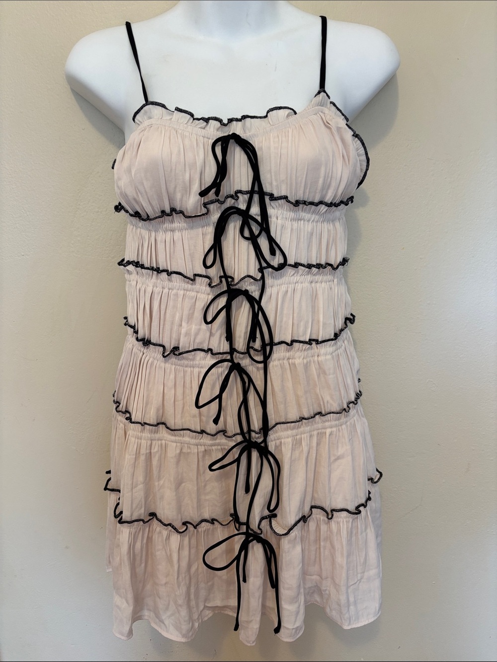 AKIRA Blush Pink Tiered Ruffle Dress with Black Trim and Front Ties
